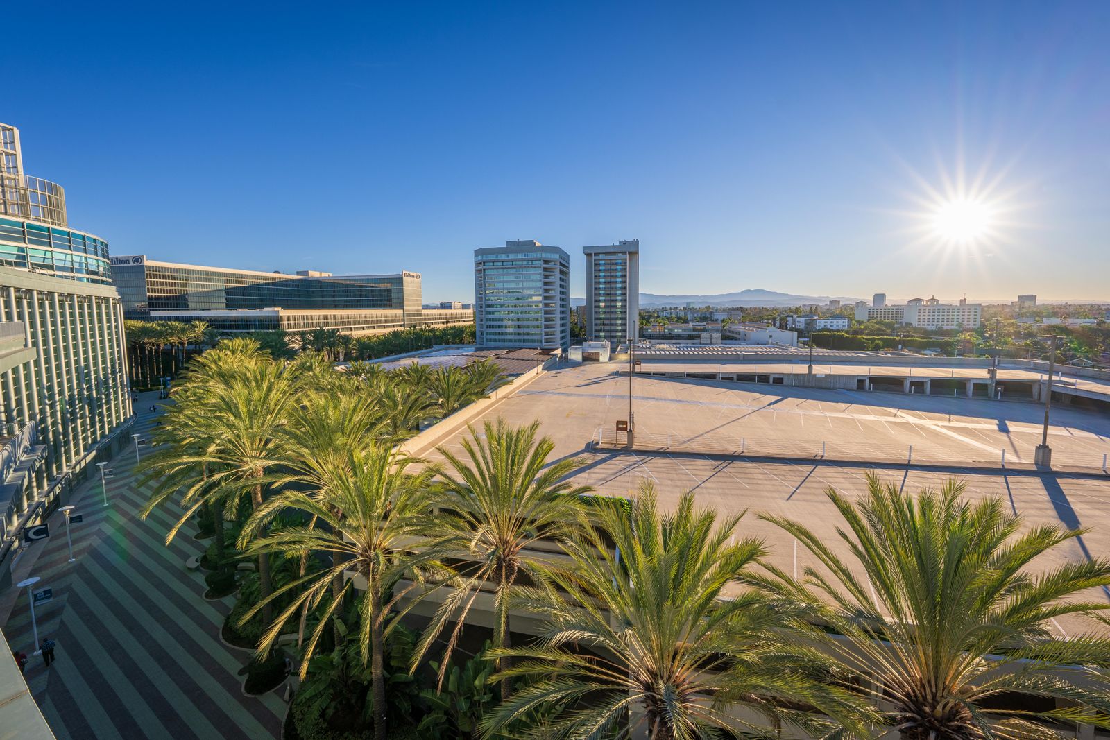 Anaheim, California under an evening sky, looking across the city toward the hills