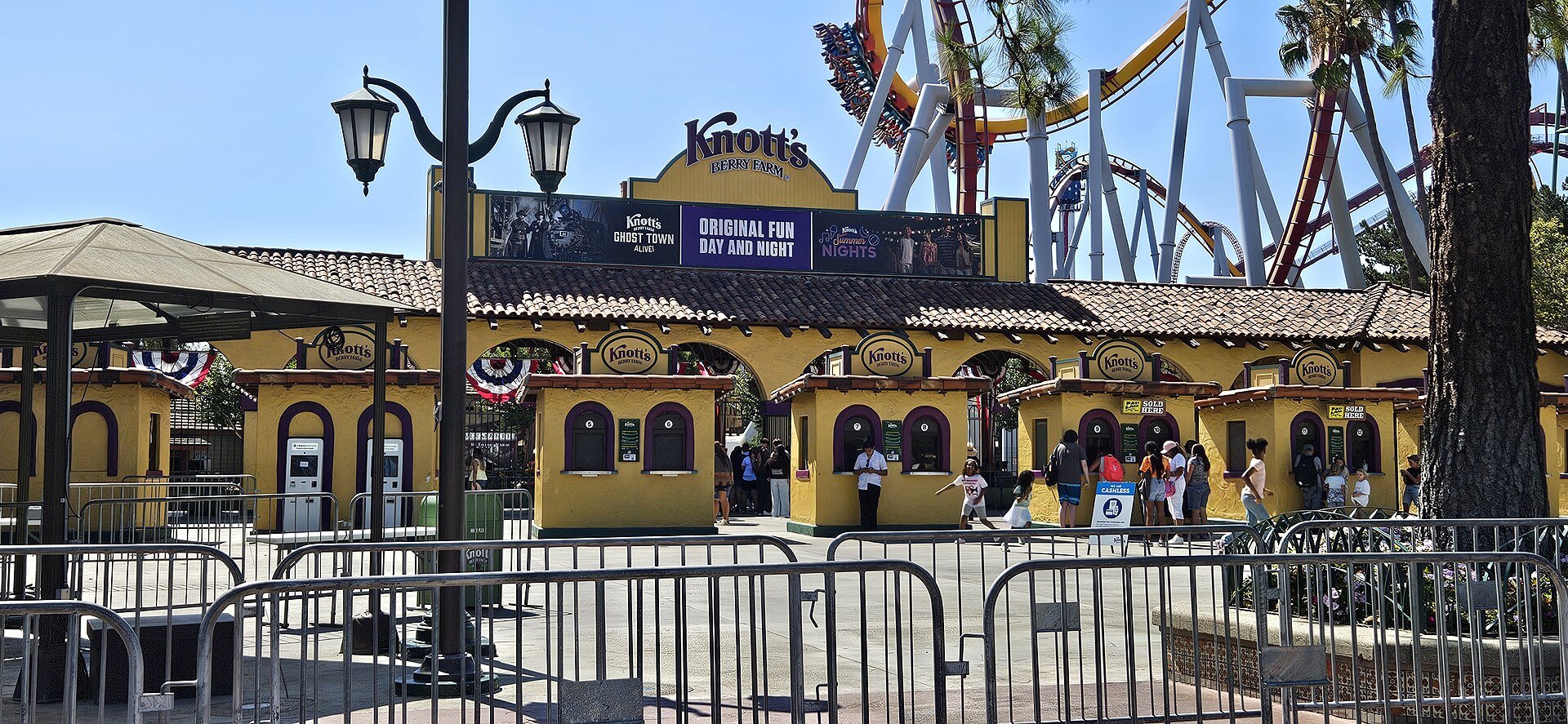 Entrance to Knott's Berry Farm in Buena Park with rides visible behind the gates