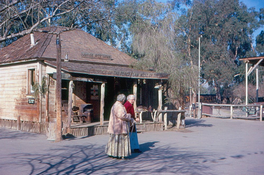 Old West buildings and visitors in Ghost Town at Knott's Berry Farm